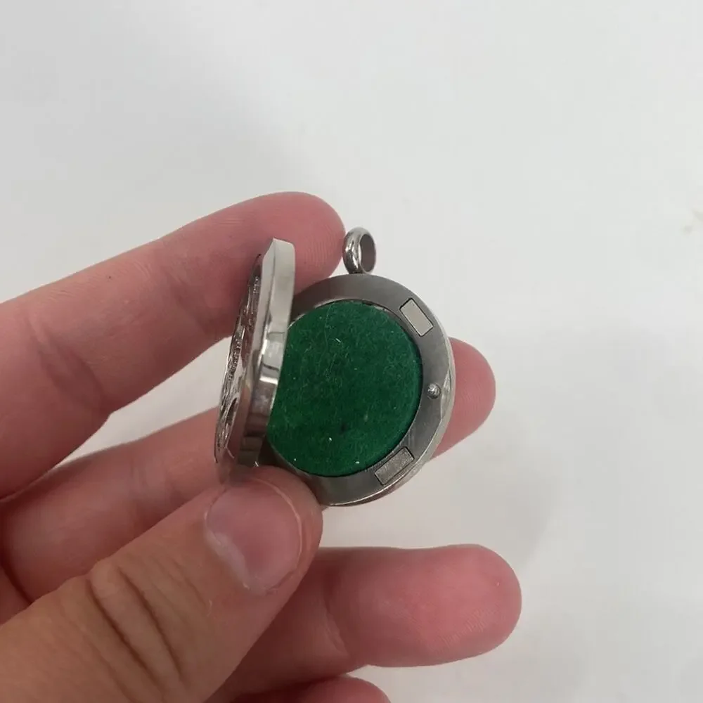 Green and silver aromatherapy diffuser locket pendant